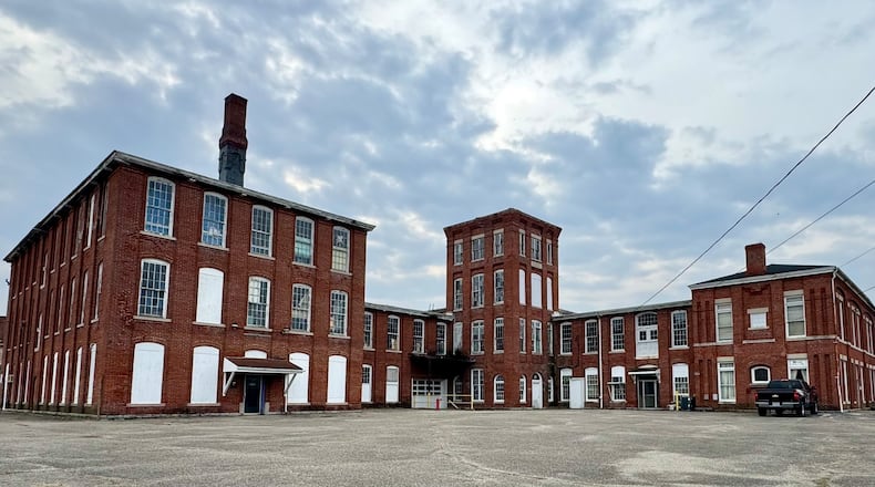 Pictured is the Shuler Benninghofen building, the former woolen mill in Lindenwald. The state is considering providing the redevelopment of the 130-year-old structure into a mixed-used development which would provide residential opportunities as well as commercial and restaurant spaces. MICHAEL D. PITMAN/STAFF