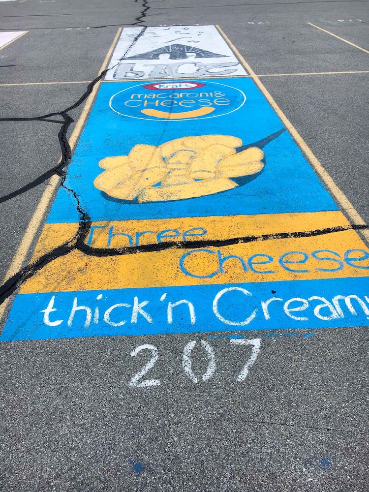 PHOTOS Lakota East seniors paint parking spots