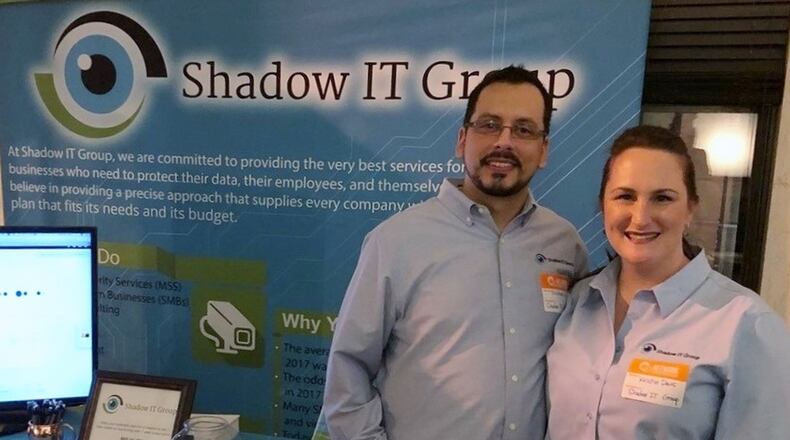 Mason-based Shadow IT Group is a new business dedicated to cybersecurity for small- and medium-sized businesses, as well as individuals. From left are CEO Matthew Davis, and his wife, Kristin Davis, the company’s CFO and CMO. CONTRIBUTED