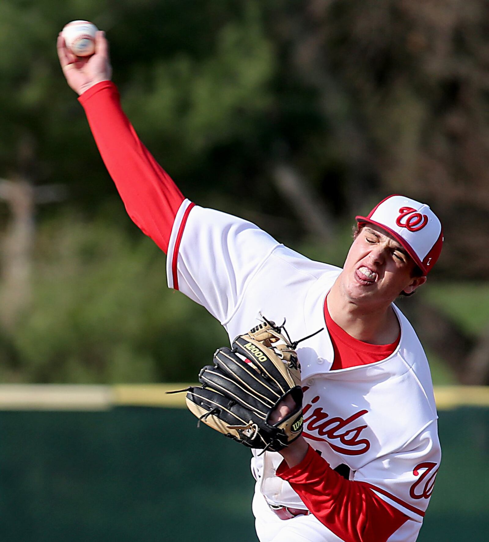 Lakota West pitcher Jacob Kates delivers a pitch to a Hamilton batter during Sunday’s game in West Chester Township. CONTRIBUTED PHOTO BY E.L. HUBBARD