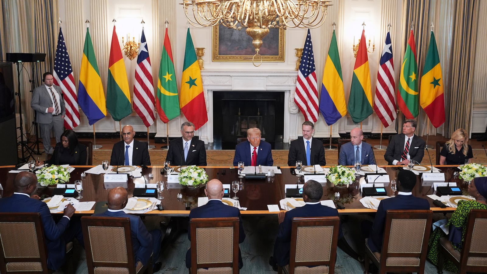 President Donald Trump speaks with African leaders including Senegalese President Bassirou Diomaye Faye, Liberian President Joseph Nyuma Boakai, Bissau-Guinean President Umaro Sissoco Embal€, Mauritanian President Mohamed Ould Ghazouani and Gabonese President Brice Oligui Nguema during a lunch in the State Dining Room of the White House, Wednesday, July 9, 2025, in Washington. (AP Photo/Evan Vucci)