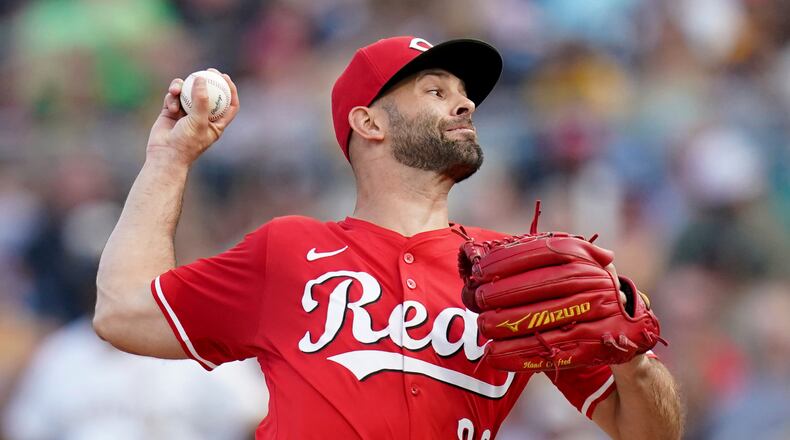 Cincinnati Reds pitcher Nick Martinez delivers during the first inning of a baseball game against the Pittsburgh Pirates Saturday, Aug. 9, 2025, in Pittsburgh. (AP Photo/Matt Freed)