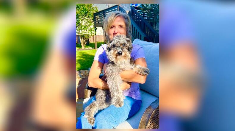 Butler County Auditor Nancy Nix is seen with her dog, Casey. Nix says the county's dog licensing program is now updated. CONTRIBUTED