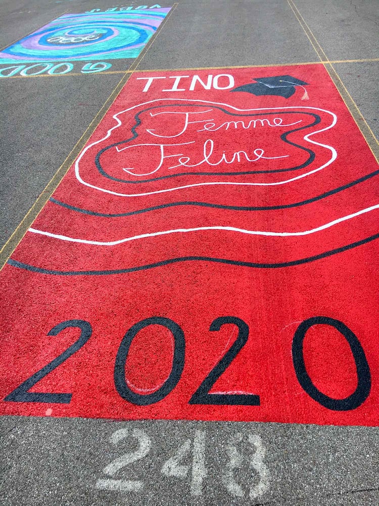 PHOTOS Lakota East seniors paint parking spots