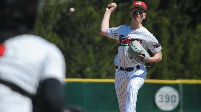 Lakota West's Caleb Binder sends a pitch to the plate against Milford on Saturday at Lakota West. CHRIS VOGT / CONTRIBUTED