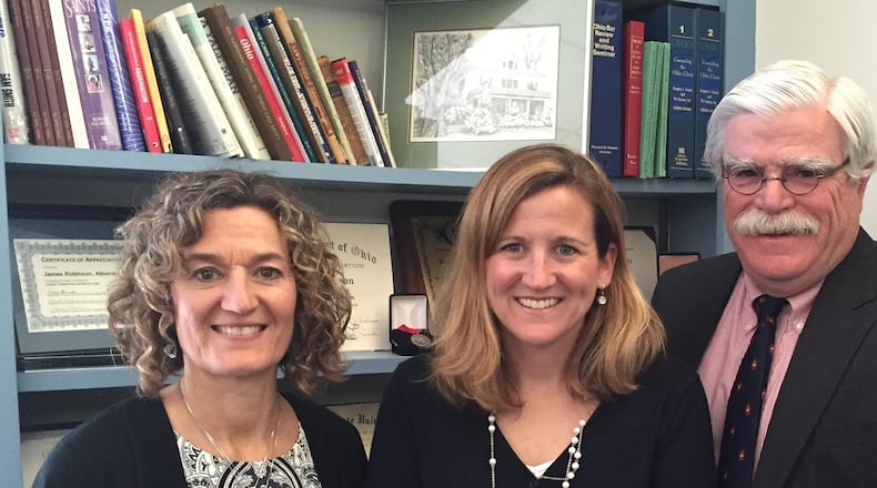 Robinson & Jones Co., LPA attorneys Cathryn Loucas, Tara Jones and Jim Robinson.