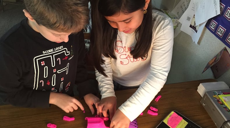 A team of third-grade students at Cherokee Elementary School gave up their recess time to create a prosthetic hand for another child as part of the Prosthetic Kids Hand Challenge. CONTRIBUTED