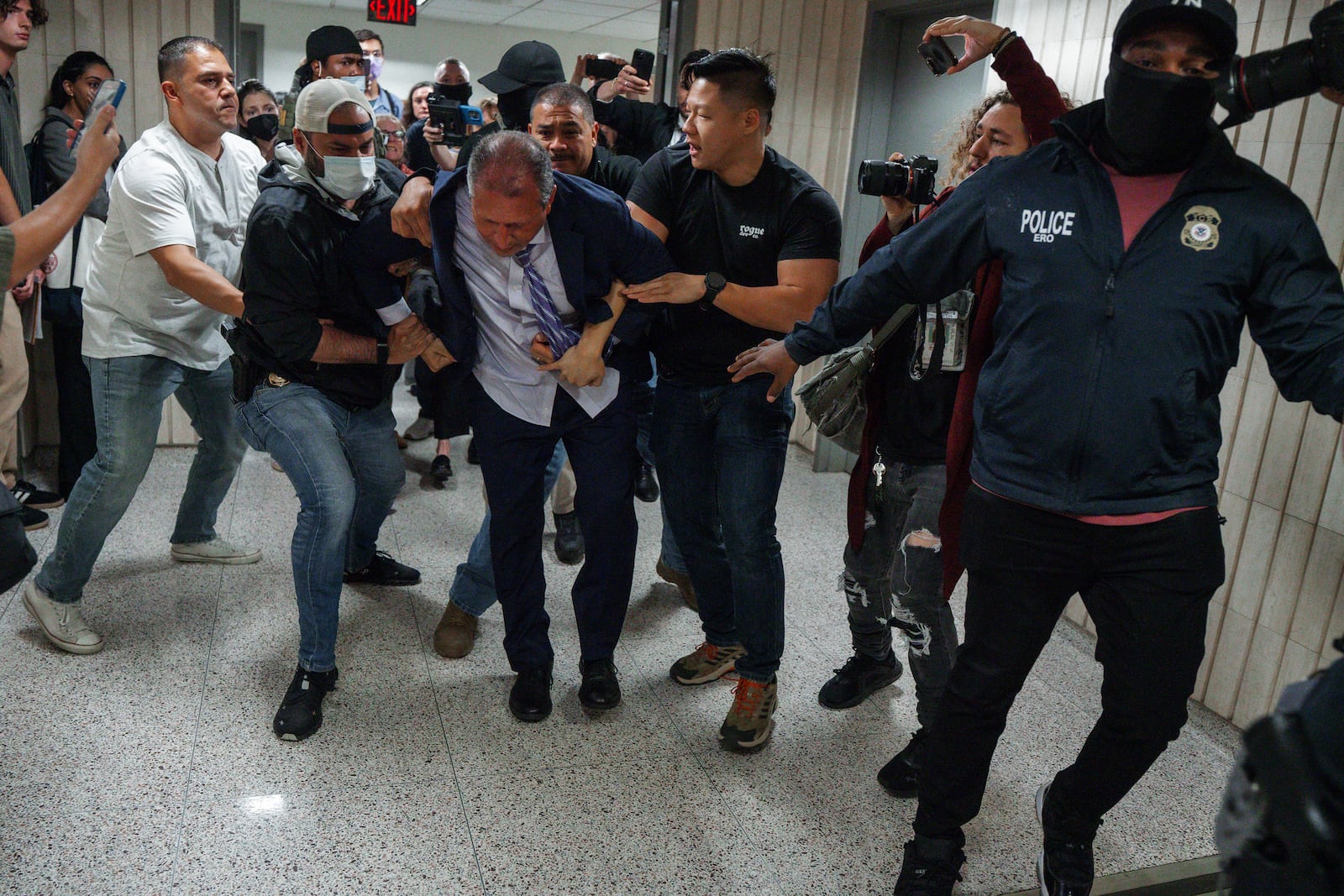 New York City Comptroller Brad Lander is placed under arrest by Immigration and Customs Enforcement (ICE) and FBI agents outside federal immigration court on Tuesday, June 17, 2025, in New York. (AP Photo/Olga Fedorova)