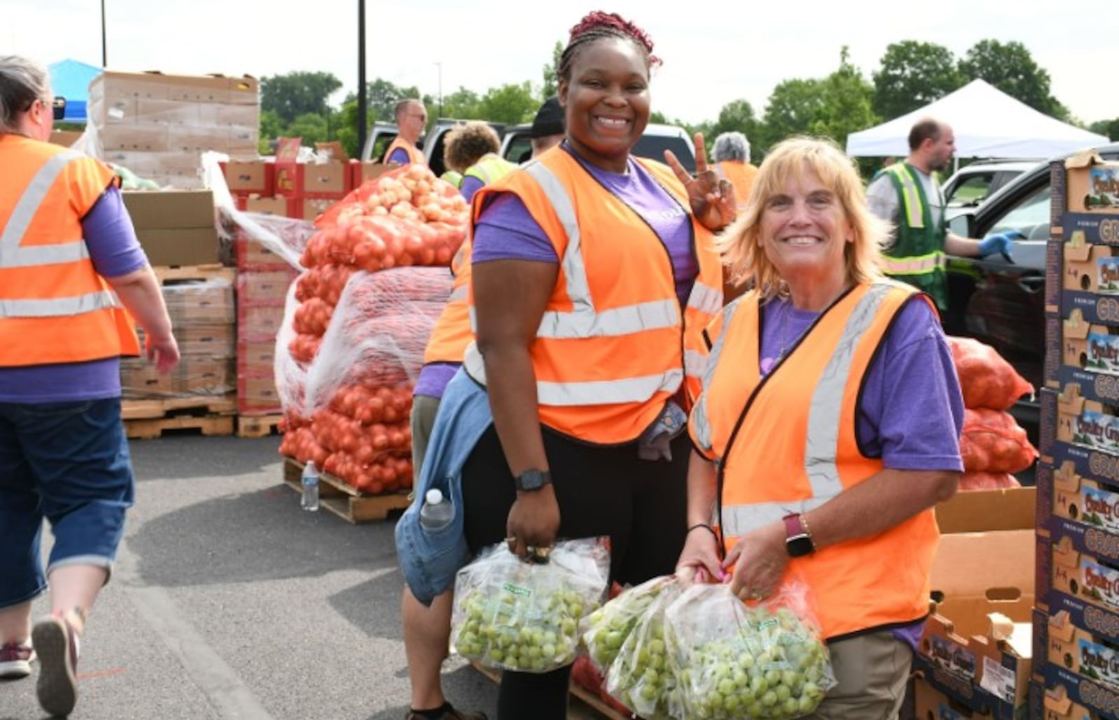 The Foodbank volunteers distribute fruit to those in need. THE FOODBANK/CONTRIBUTED