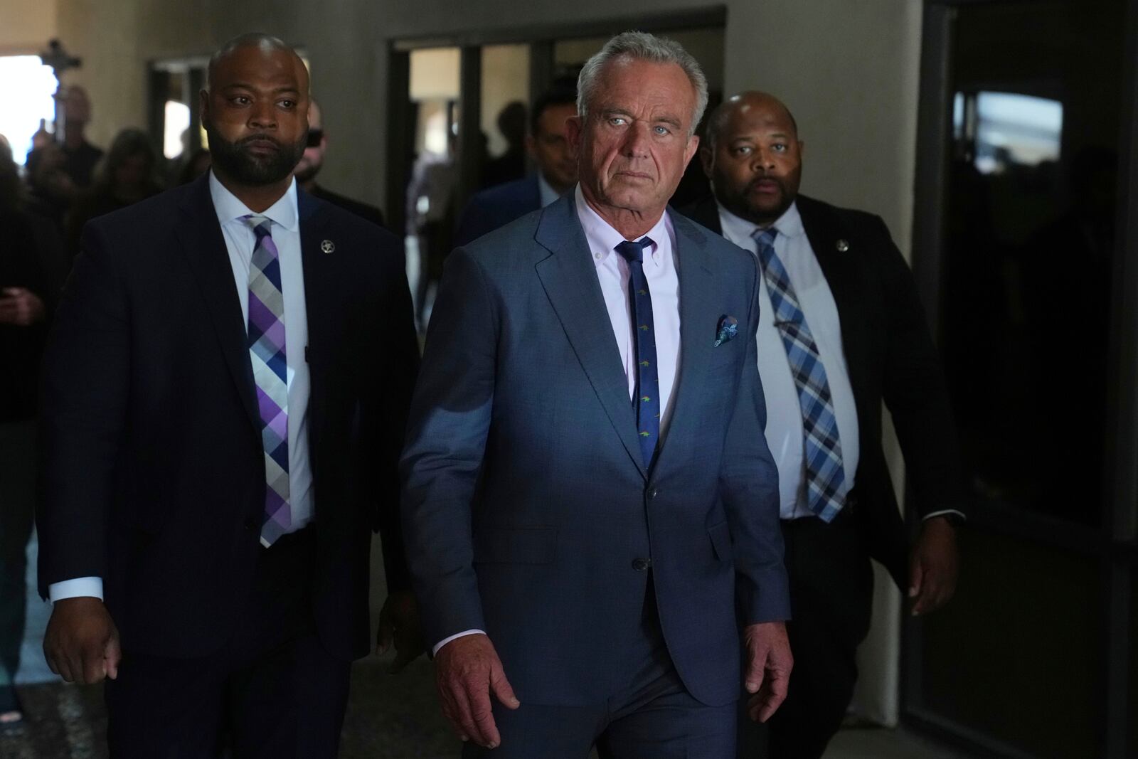 U.S. Health Secretary Robert F. Kennedy Jr. tours the Native Health Mesa Food Distribution Center in Mesa, Ariz., Tuesday, April 8, 2025. (AP Photo/Ross D. Franklin)