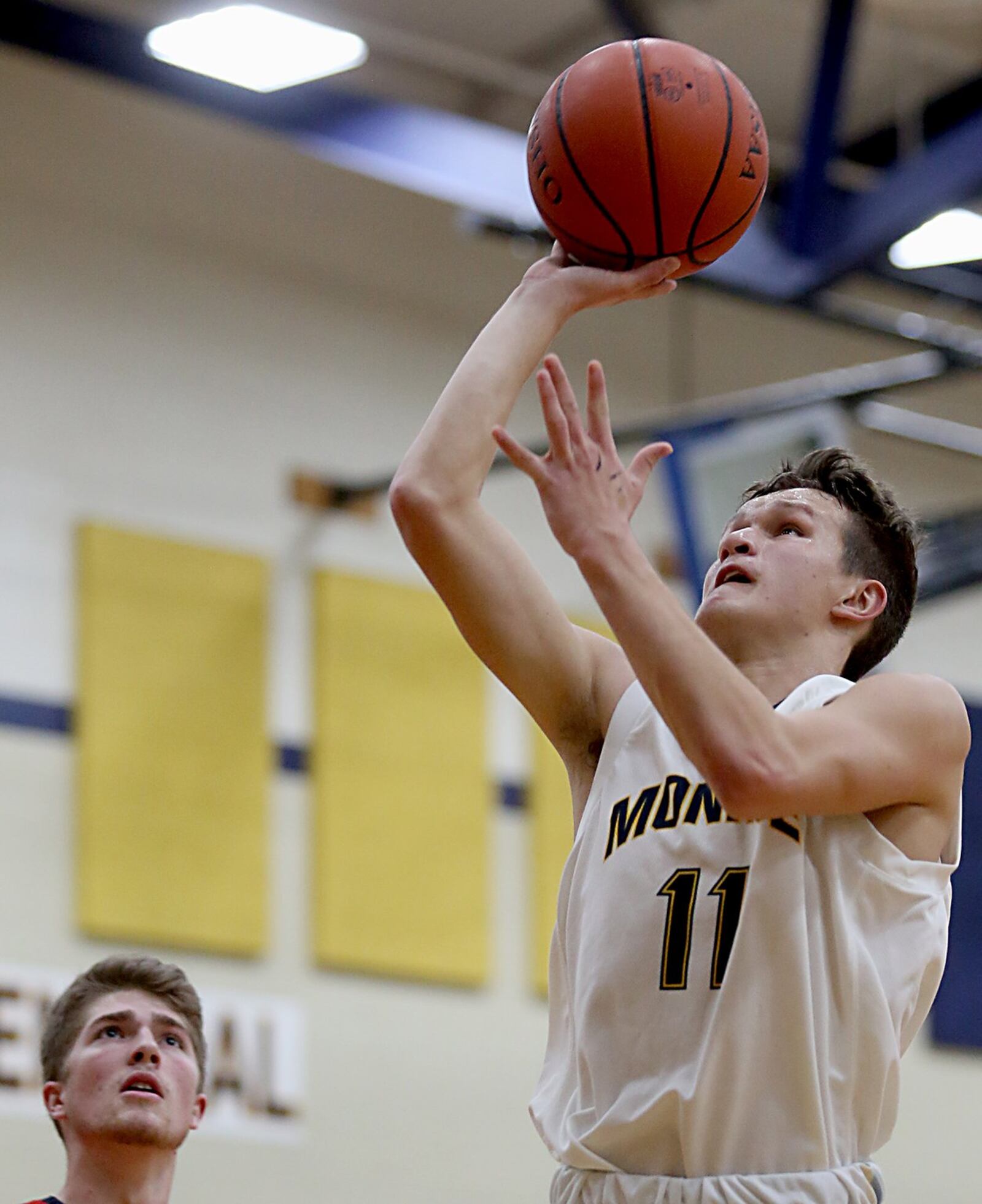 Monroe guard Thryceton Deckard puts in two points against visiting Talawanda on Tuesday night. CONTRIBUTED PHOTO BY E.L. HUBBARD