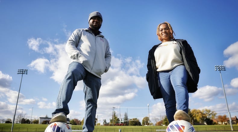 Middletown grad Zayion Hyman, right, played soccer for the Middies while she was in school and was coached by her father, Jeremy Hyman, left. Now she teaching at Highview and is assistant coach for the same team she played on. NICK GRAHAM/STAFF