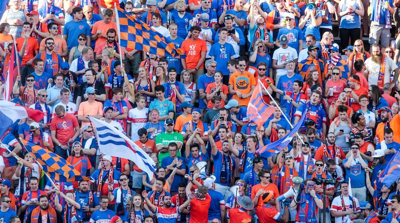 Fans cheer on the FC Cincinnati team as they play English Premier League team Crystal Palace in a friendly match Saturday, July 16 at Nippert Stadium in Cincinnati. NICK GRAHAM