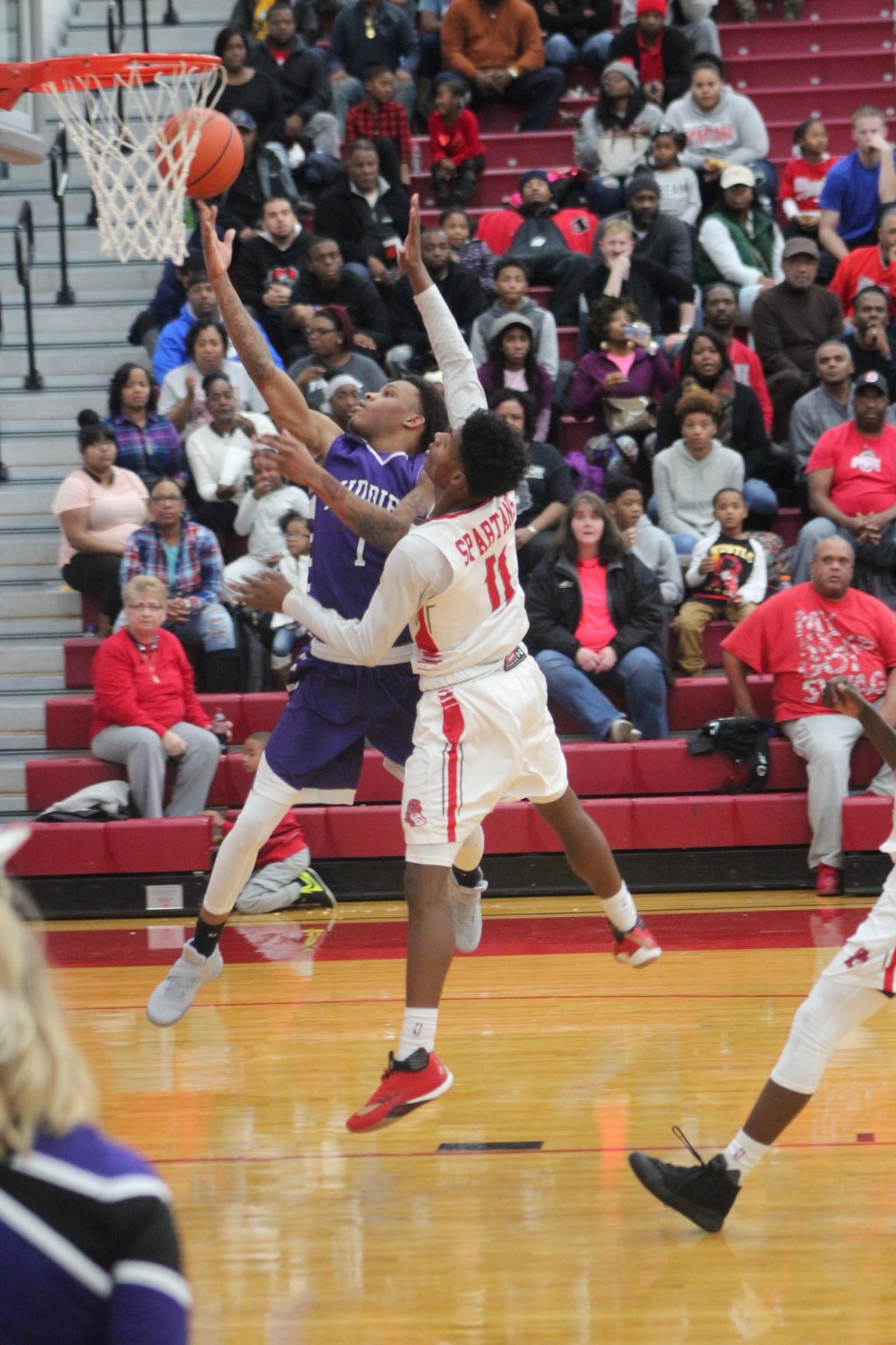 Middletown’s Nelson Rutledge scores over Lima Senior’s Jaleel King during Friday night’s contest in Lima. CONTRIBUTED PHOTO BY MARITZA MCKINNEY