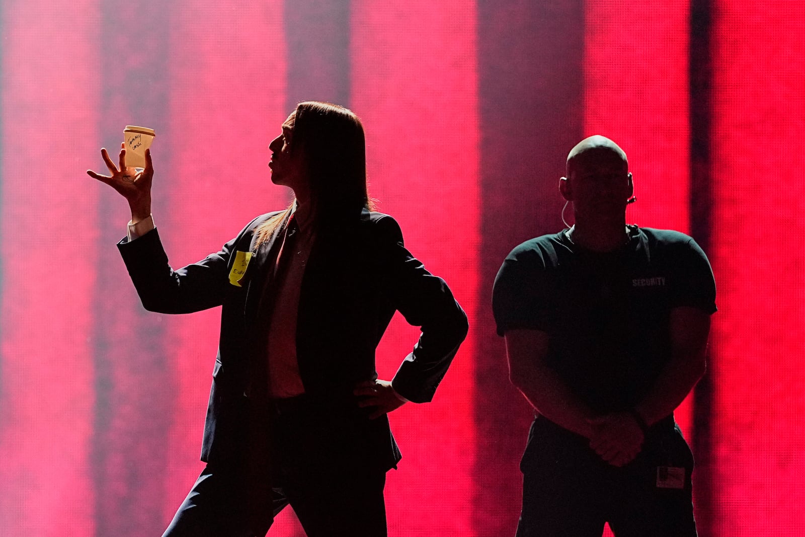 Tommy Cash from Estonia performs the song "Espresso Macchiato" during the first semi-final of the 69th Eurovision Song Contest, in Basel, Switzerland, Tuesday, May 13, 2025. (AP Photo/Martin Meissner)