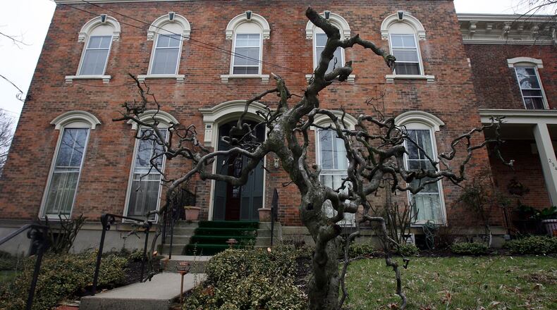 “Reverse scholarships” will be made available to people who move into any of several Hamilton urban neighborhoods, like Rossville, when the people have graduated within the past 7 years and have yet to move into the city. Other neighborhoods are the downtown central business district; Riverview; German Village; and Dayton Lane. GREG LYNCH / STAFF