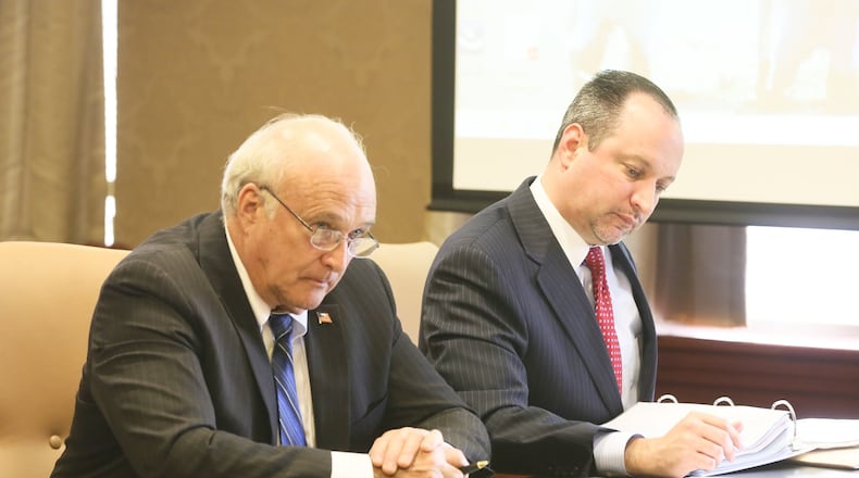 Butler County Prosecutor Mike Gmoser and Brad Burress listen to Judge Charles Pater during a pre-trial hearing in the Daniel French case, Friday, Oct. 9, 2015. GREG LYNCH / STAFF