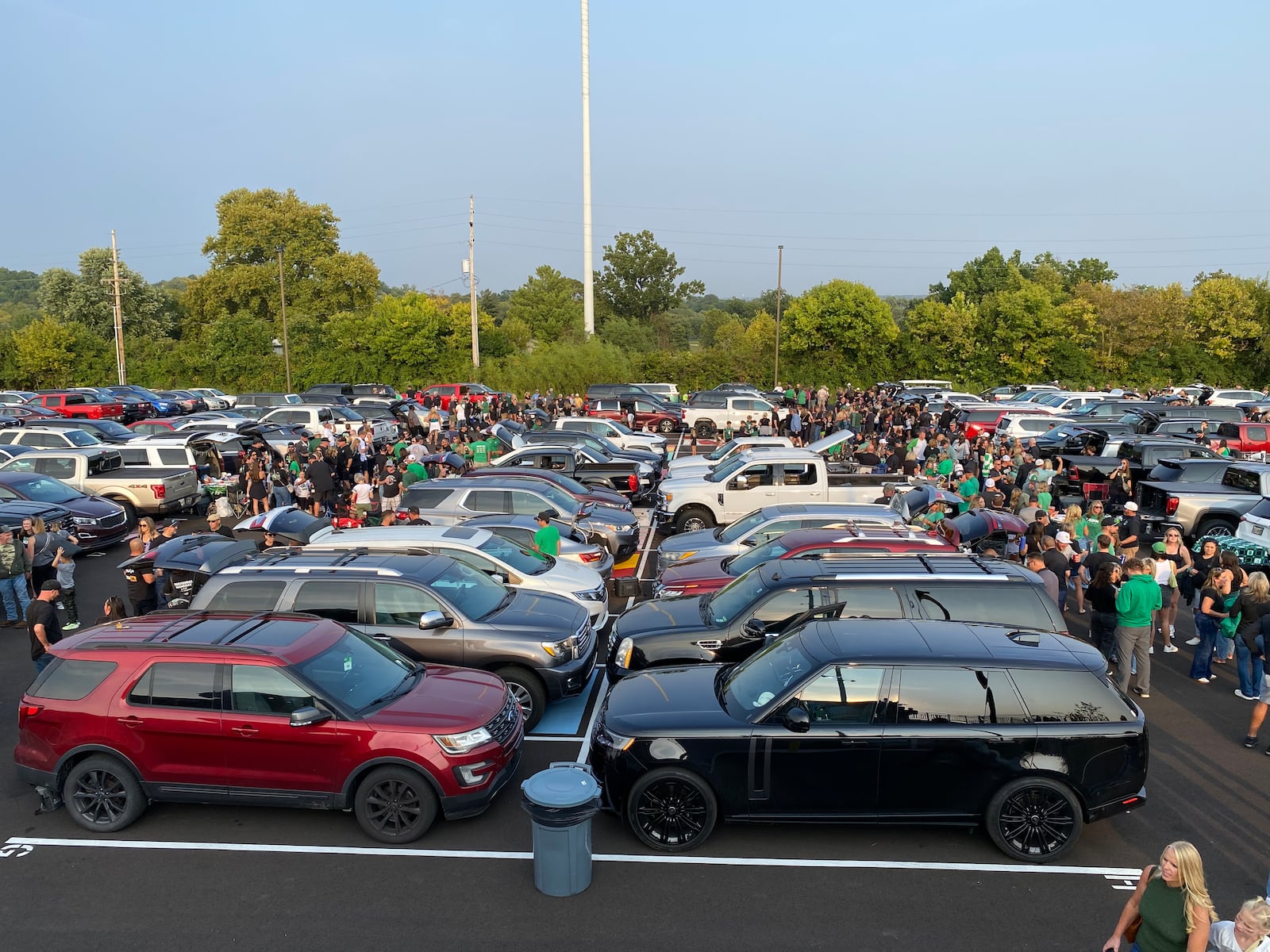 Badin High School’s first home football game Friday evening was 60 years in the making. Tailgaters flooded the parking lot and a standing room only crowd packed into the school’s first football game in its recently opened stadium as thousands turned out to join in to be part of Butler County prep sports history. (Photo By Michael D. Clark/Journal-News)
