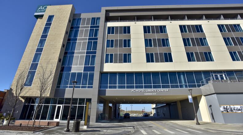 The AC Hotel Cincinnati North/West Chester at Liberty Center in Liberty Twp. is one of two area hotels to be hit with layoffs. NICK GRAHAM/STAFF FILE PHOTO