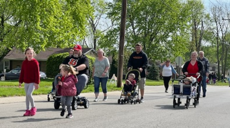 Joe Nuxhall Miracle League Opening Day Parade will kick off at 10 a.m. April 20 from Sacred Heart Church and winds its way to the Joe Nuxhall Miracle League Fields for a special on-field celebration. For more information, go to nuxhallmiracleleague.org. Pictured is some of last year's parade participants. AMY BURZYNSKI/STAFF