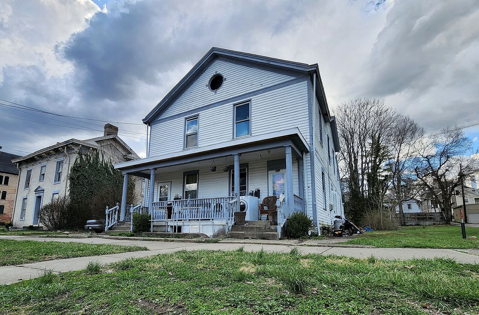 The Hamilton CIC is purchasing properties on South C Street (pictured) and Ross Avenue. Pictured is a four-unit building on South C Street the city plans for redevelopment. NICK GRAHAM/STAFF