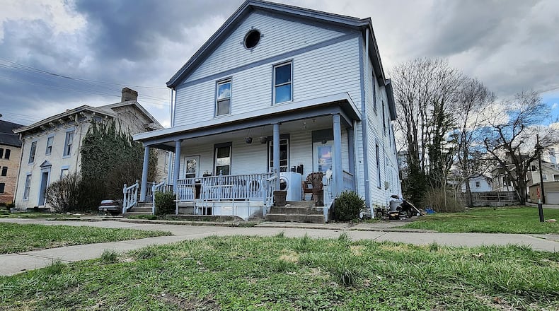 The Hamilton CIC is purchasing properties on South C Street (pictured) and Ross Avenue. Pictured is a four-unit building on South C Street the city plans for redevelopment. NICK GRAHAM/STAFF
