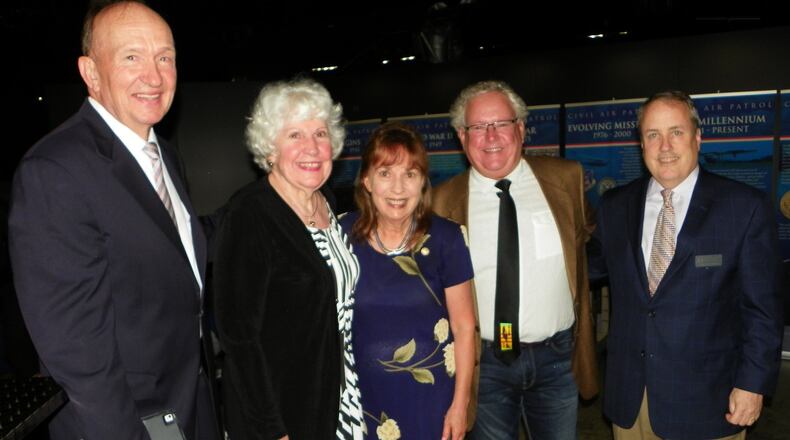 U.S. Air Force Capt. (Ret.) Guy Gruters and his wife, Sandy; U.S. Army Capt. Carolyn Abby Auclair; Jim White, president of the Dayton Area Ford Dealers Association; and Mike Imhoff, executive director of the Air Force Museum Foundation Inc., attend a Ford Oval of Honor event June 21 honoring Auclair, Gruters and U.S. Air Force (Ret.) Lt. Col. Mike Scoop Jackson. Contributed photo