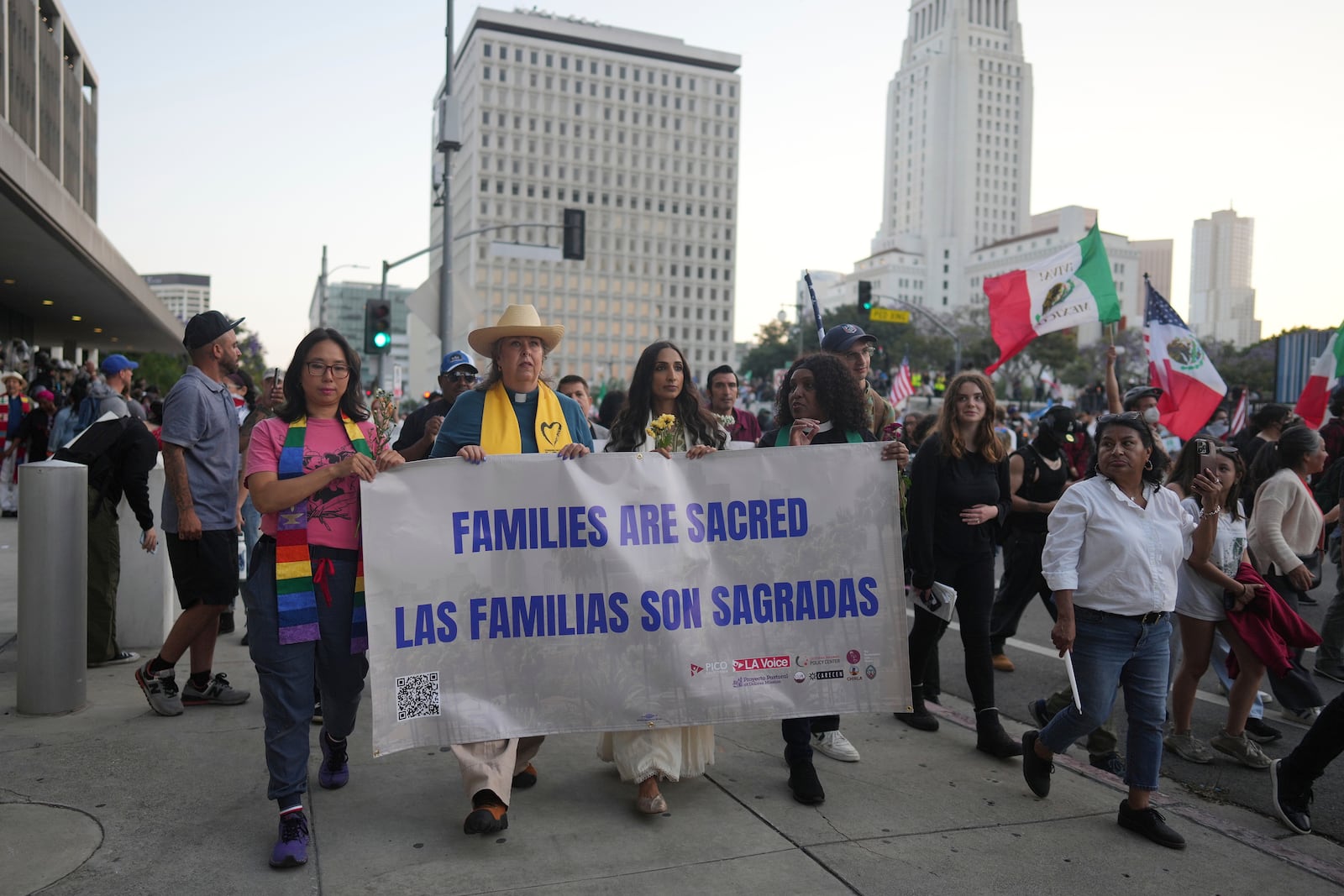 Demonstrators march during a protest Tuesday, June 10, 2025, in Los Angeles. (AP Photo/Eric Thayer)
