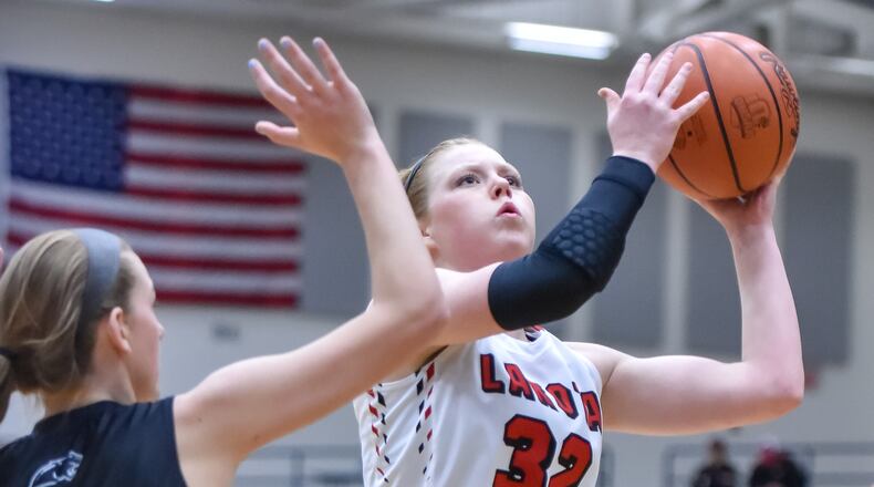 Lakota West’s Abby Prohaska puts up a shot over Springboro’s Haylie Crouch during their Division I regional girls basketball semifinal Wednesday, March 2 at Trent Arena in Kettering. Lakota West won the game 55-42. NICK GRAHAM/STAFF