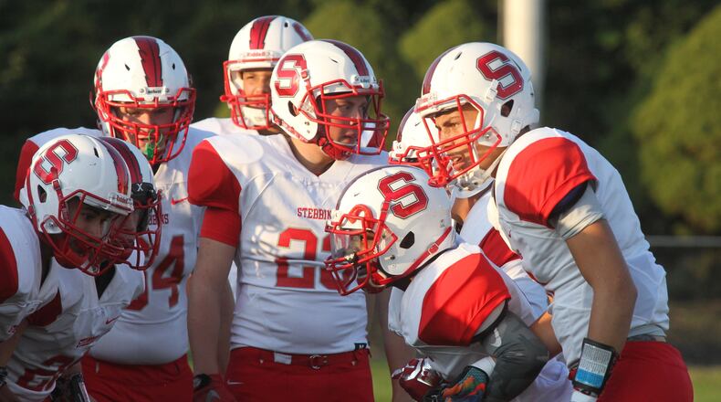 Stebbins prepares to take the field against Kenton Ridge on Friday, Sept. 8, 2017, in Springfield. David Jablonski/Staff