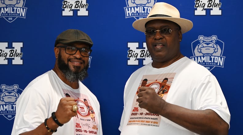 Former heavyweight boxing champions Lamon Brewster (left) and James "Buster" Douglas, pictured here at Hamilton High School on July 17, 2024, are leading a pair of teams of boxers for the Hamilton Ohio Amateur Boxing Classics happening at the high school on Saturday, Aug. 24. The pair will have a bowling fundraiser the day prior on Aug. 23 at Pohlman Lanes in Hamilton where people can bowl with the champs. MICHAEL D. PITMAN/STAFF