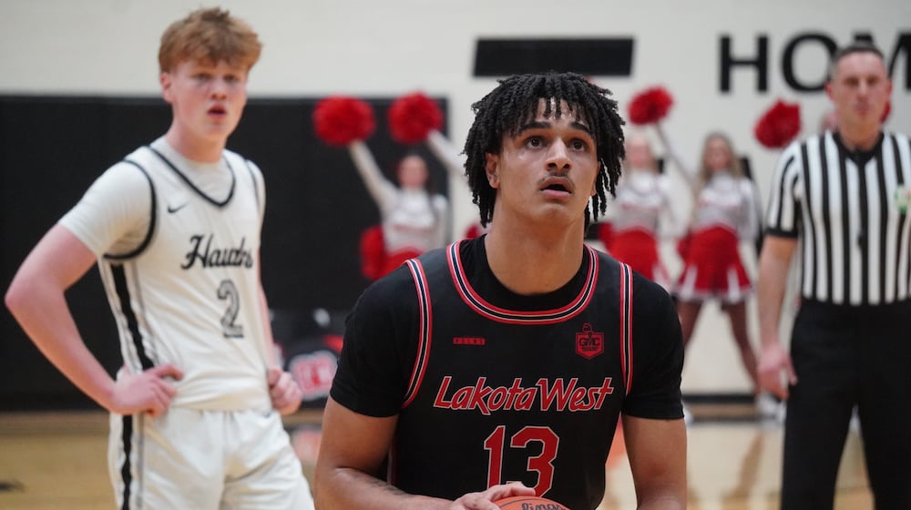 Lakota West’s Roman Combs eyes a free-throw attempt against Lakota East on Friday night. CHRIS VOGT / CONTRIBUTED