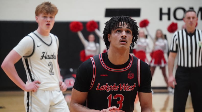 Lakota West’s Roman Combs eyes a free-throw attempt against Lakota East on Friday night. CHRIS VOGT / CONTRIBUTED