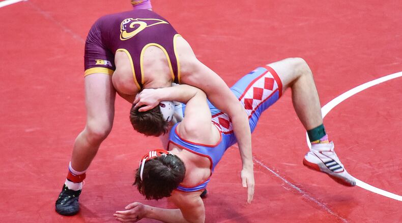Logan Iams of Ross wrestles Dominic Policano of Kings, in the 182-pound weight class during the Ron Masanek Fairfield Invitational wrestling tournament Jan. 11, 2019, at Fairfield High School. NICK GRAHAM/STAFF
