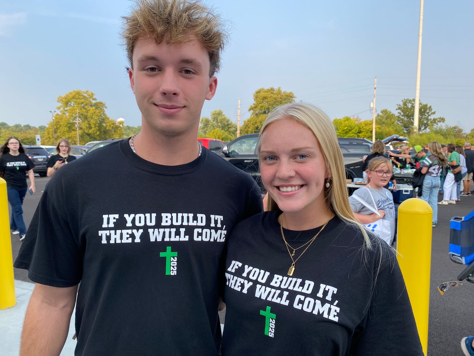 Badin High School’s first home football game Friday evening was 60 years in the making. And a standing room only crowd packed into the school’s first football game in its recently opened stadium and thousands turned out to join in to be part of Butler County prep sports history. Pictured are Badin seniors Jay Carmella and Avery Niesen. (Photo By Michael D. Clark/Journal-News)