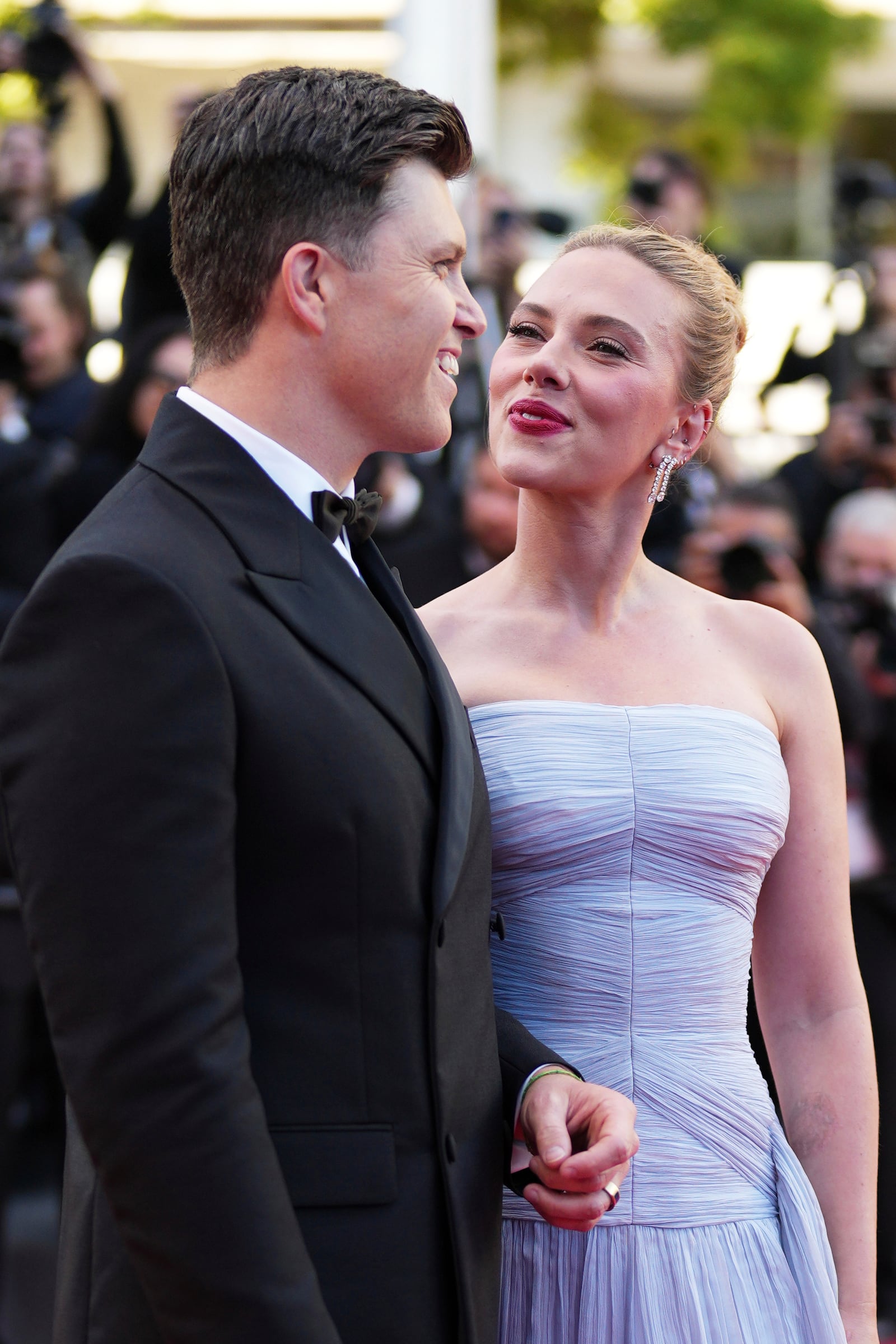 Colin Jost, left, and Scarlett Johansson pose for photographers upon arrival at the premiere of the film 'A Private Life' at the 78th international film festival, Cannes, southern France, Tuesday, May 20, 2025. (Photo by Scott A Garfitt/Invision/AP)