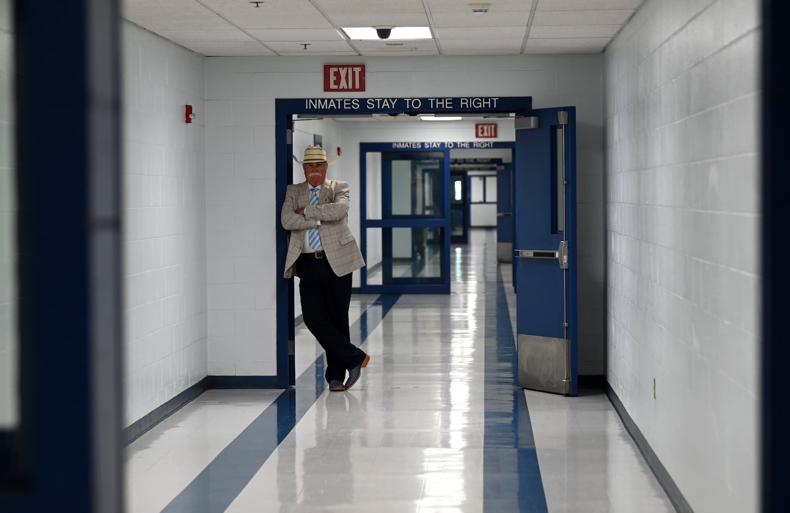 Butler County Sheriff Richard Jones has taken a hard stance on immigration since taking office more than two decades ago. He had 10 deputies credentialed to serve as ICE agents in the county, and said he plans to have more deputies eventually go through the training. Pictured is Jones in the hallway of the Butler County Jail on Wednesday, June 9, 2025. MICHAEL D. PITMAN/STAFF