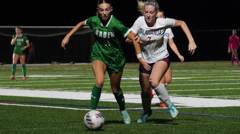 Badin’s Sophia Combs (11) and Talawanda's Gabby Dillon (7) go after a loose ball in a girls soccer Division III district semifinal on Monday, Oct. 21, 2024, at Spooky Nook. CONTRIBUTED BY CHRIS VOGT