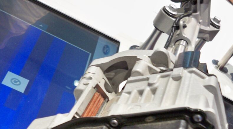 A cutaway of a typical electric power steering gear shows the electronics that are included within the assembly. James Halderman photo