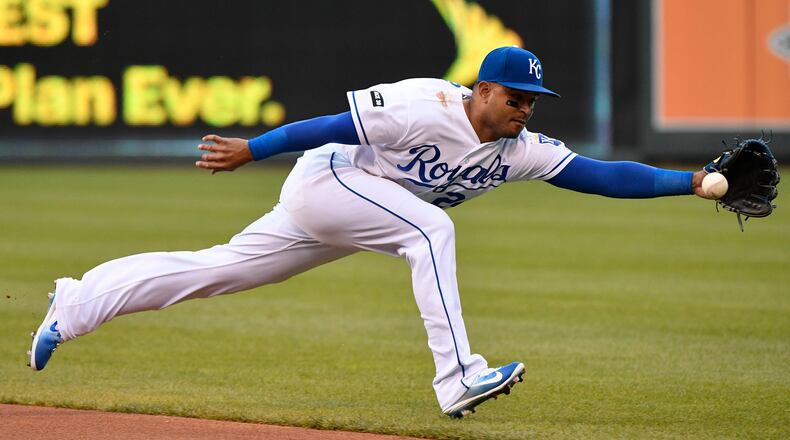 KANSAS CITY, MO - MAY 2: Christian Colon #24 of the Kansas City Royals reaches out but can’t stop a ball hit by Yolmer Sanchez #5 of the Chicago White Sox in the first inning at Kauffman Stadium on May 2, 2017 in Kansas City, Missouri. (Photo by Ed Zurga/Getty Images)