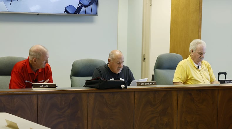 The Morgan Twp. trustees won't place Administrator/Fire Chief Jeff Galloway on administrative leave, despite allegations he double-dipped his salary because he is "innocent until proven guilty." NICK GRAHAM/STAFF