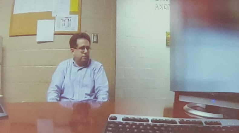 Police body cam footage shows Tracey Abraham, a substitute teacher accused of fondling himself in a classroom, being interviewed after the alleged incident. It was shown at a hearing on Wednesday, March 21, 2019. NICK GRAHAM / STAFF