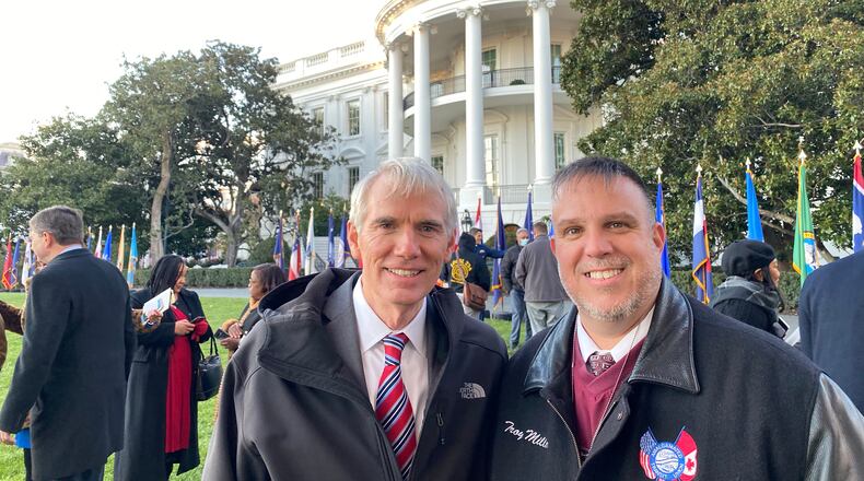 Liberty Twp. resident Troy Miller, right, poses with Ohio Sen. Rob Portman after President Joe Biden's signing this week of a $1 trillion infrastructure bill outside of the White House. Miller, who president of the Amalgamated Transit Union Local 627 in Cincinnati, says it was thrill to be so close to the historic signing, which Portman was instrumental in making happen. (Provided Photo\Journal-News)