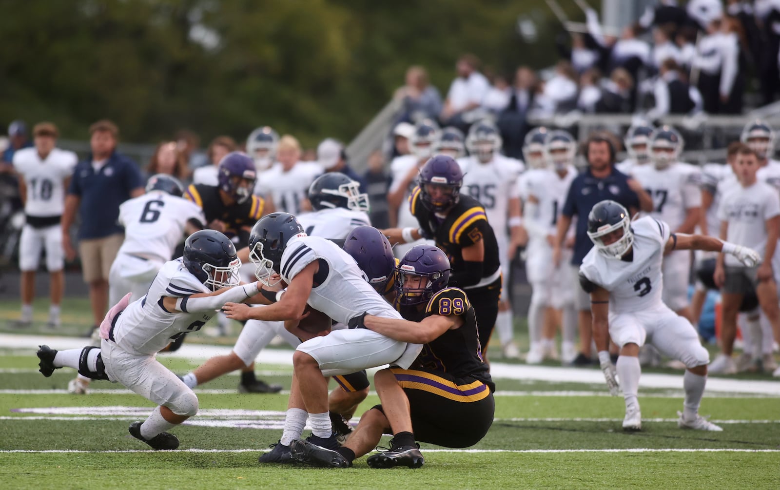 Bellbrook's Jude Omiatek tackles Valley View's Anthony Valenti on Friday, Sept. 6, 2024, in Bellbrook. David Jablonski/Staff