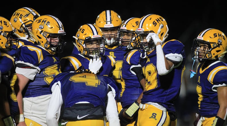 Springfield's offense huddles during a game against Olentangy Liberty on Friday, Oct. 30, 2020, at Springfield. David Jablonski/Staff