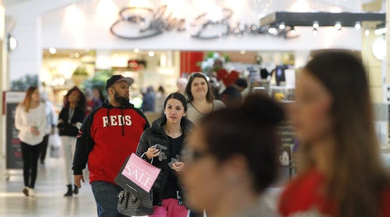 The Dayton Mall was busy on Tuesday afternoon. Shoppers have flooded area stores and malls returning unwanted gifts they received this holiday season. Most stores have made it an easy task, but others have made it difficult for a reason. According to the National Retail Federation’s latest Return Fraud Survey, retailers estimate that 3.5 percent of their holiday returns this year will be fraudulent, up slightly from the estimated 3 percent reported last year. Holiday return fraud is expected to cost retailers $2.2 billion, up from approximately $1.9 billion last year.. TY GREENLEES / STAFF