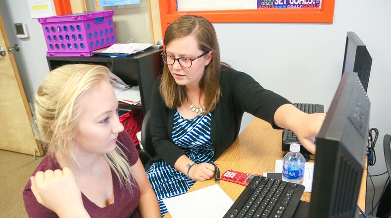 Marshall High School math teacher Skylar Folkens works with student Savannah Smith at the school, Tuesday, July 25, 2017. GREG LYNCH / STAFF Marshall High School english teacher Rachel Osterday works with student Shanae Davis at the school, Tuesday, July 25, 2017. GREG LYNCH / STAFF Marshall High School in Middletown is is celebrating its fifth year August with an open house. GREG LYNCH / STAFF Kelvin Moss talks about the future of Marshall High School, Tuesday, July 25, 2017. GREG LYNCH / STAFF