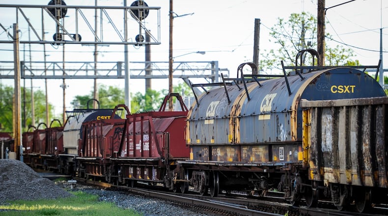 A pair of local state lawmakers want to levy steep fines against train companies that have trains unlawfully block intersections for longer than 5 minutes. This may be a challenge because of federal law. NICK GRAHAM/FILE