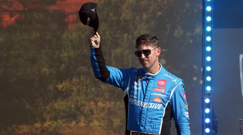 FILE - Denny Hamlin is introduced before a NASCAR Cup Series auto race Sunday, Nov. 2, 2025, in Avondale, Ariz. (AP Photo/Rick Scuteri, File)