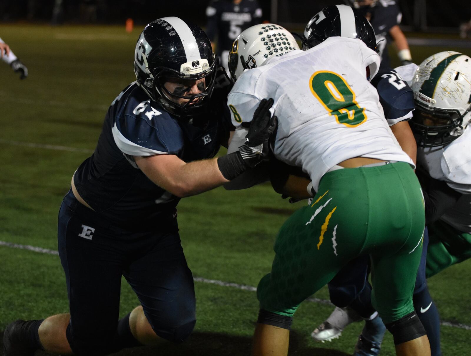 Edgewood’s Jacob Sousa (left) squares off with Little Miami’s Dimetrias Francisco (8) during Friday night’s Division II, Region 8 playoff game at Kumler Field in St. Clair Township. Edgewood lost 10-7. CONTRIBUTED PHOTO BY DAWN JOSEPH